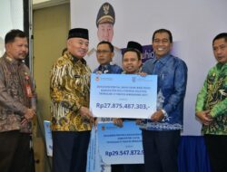 Bupati HSS Terima Bagi Hasil Pajak Daerah