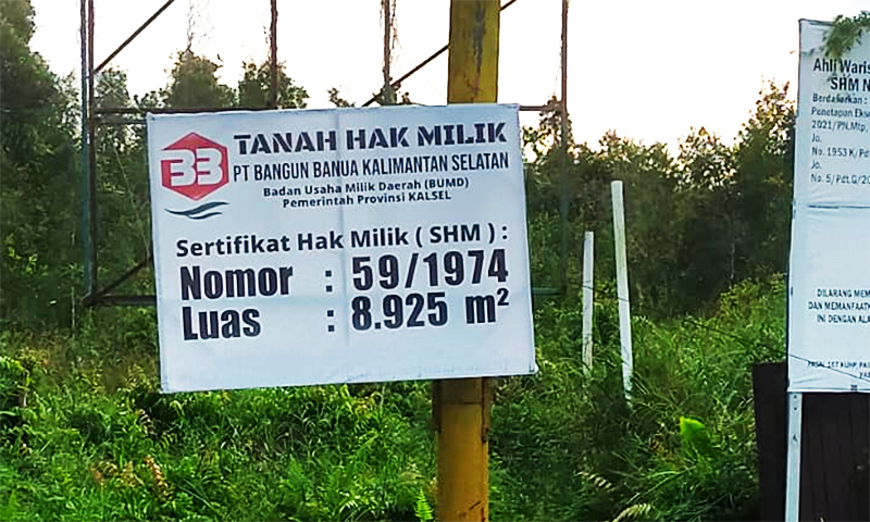 Papan Plang yang dipasang atas nama PT Banguna Banua Kalimantan Selatan, yang sebetulnya perkara ini dimenangkan oleh SHM 1232 Atasnama Anna Trisula.