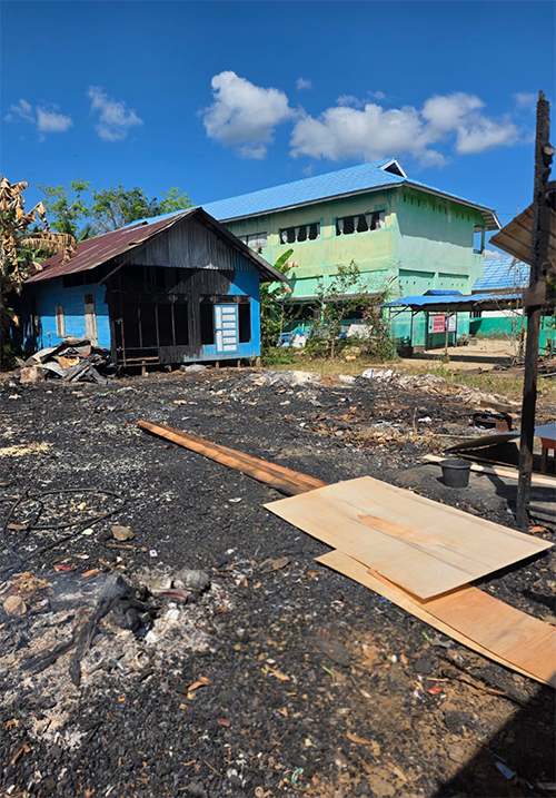 Lokasi kebarakan, rumah-rumah yang rata dengan tanah akibat terbakar. 